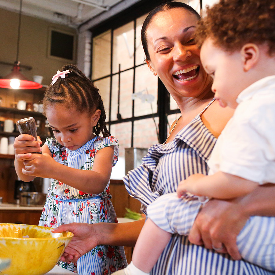 family enjoying a sticky fingers cooking private online cooking class